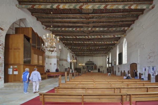 Interior view of the Church of the Holy Spirit with painted wooden ceiling, wooden beams, organ, paintings, decorations, Wismar, Mecklenburg-Western Pomerania, Germany