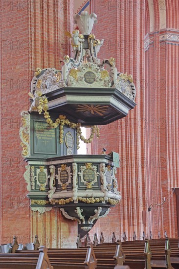 Pulpit with pulpit bonnet built in 1708, baroque, decorations, wood carvings, craftsmanship, art, pulpit lid, sounding board, pulpit canopy, brick gothic, brick church, UNESCO, St. Nikolai Church, Wismar, Mecklenburg-Western Pomerania, Germany
