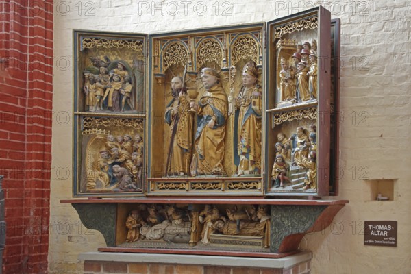 St Thomas altar with Thomas Aquinas in the centre, wood carvings, saint, monk, arts and crafts, art, decorations, winged altar, inscription, UNESCO, interior view, St Nikolai Church, Wismar, Mecklenburg-Western Pomerania, Germany