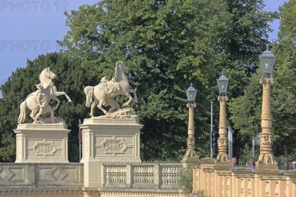 Castle bridge with two horse figures, street lamps, river bank, balustrade, Schwerin, Mecklenburg-Western Pomerania, Germany