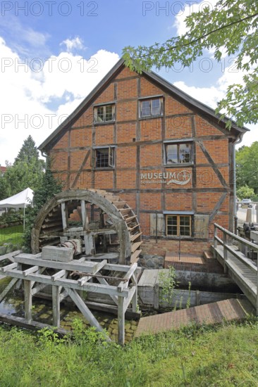Grinding mill with brick building and water wheel, mill wheel, wooden construction, inscription, museum, Fauler See, grinding mill, Schwerin, Mecklenburg-Western Pomerania, Germany