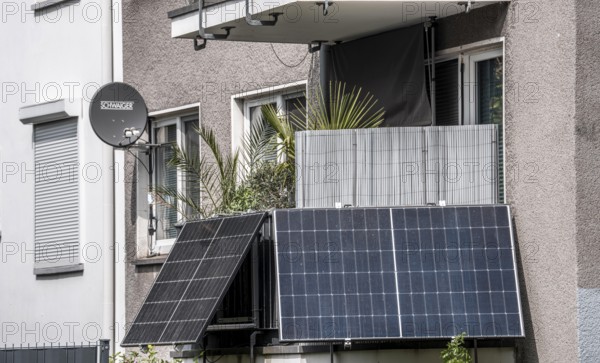 Residential building with photovoltaic modules on the balcony, balcony power plant, North Rhine-Westphalia, Germany