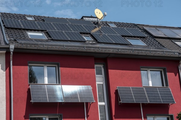 Residential building with photovoltaic modules on the façade and roof, North Rhine-Westphalia, Germany