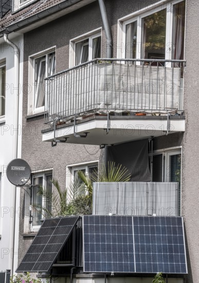 Residential building with photovoltaic modules on the balcony, balcony power plant, North Rhine-Westphalia, Germany