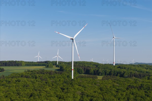 Field with several wind turbines under a bright blue sky, near Westerheim, Swabian Alb, Baden-Württemberg, Germany