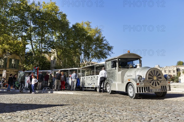 Tourist railway, tourist train, tourist group in the old town, Avignon, Vaucluse, France