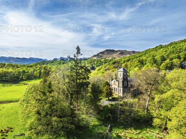 Holy Trinity Church from a drone, Bog Lane, Brathay village, Lake District, Cumbria, England, United Kingdom