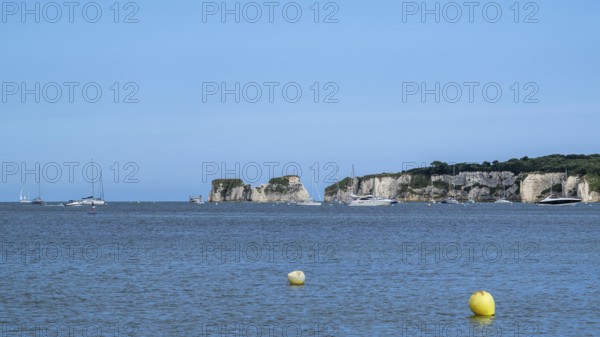 Boats on sea over Knoll Beach Studland, Poole, Dorset, England, United Kingdom
