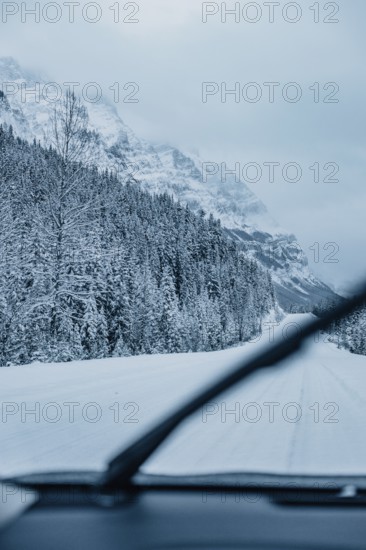 Winter road trip on the Icefields Parkway with lots of snow and ice, Banff National Park, Jasper National Park, Alberta, Canada