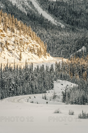 Winter road trip on the Icefields Parkway with lots of snow and ice, Banff National Park, Jasper National Park, Alberta, Canada