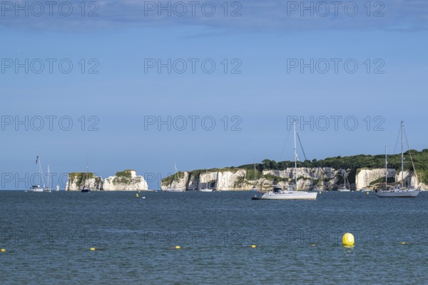 Boats on sea over Knoll Beach Studland, Poole, Dorset, England, United Kingdom
