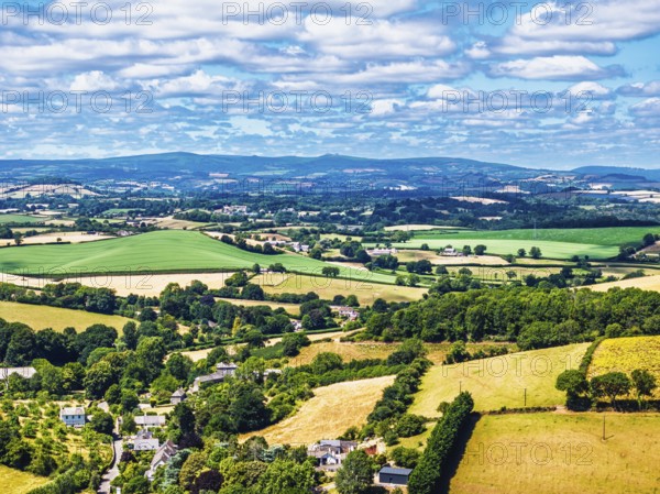 DefaultFarms and Fields over Torquay from a drone, Devon, England, United Kingdom