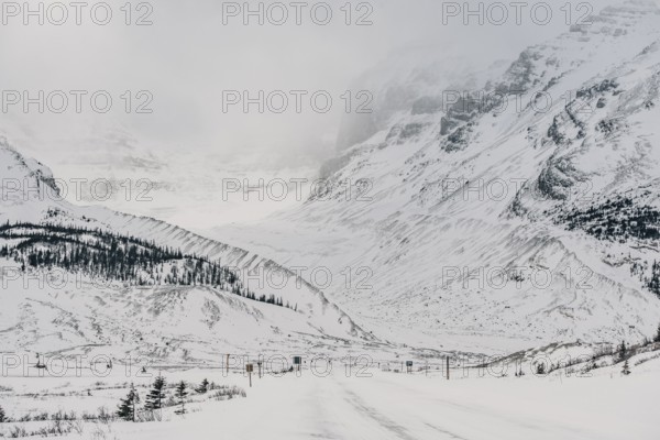Winter road trip on the Icefields Parkway with lots of snow and ice, Banff National Park, Jasper National Park, Alberta, Canada