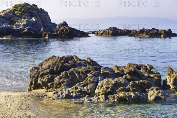 Rocky seascape with sandy beach and clear water, Ricadi, Capo Vaticano