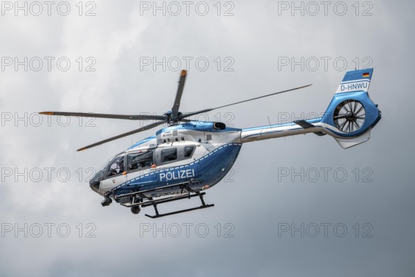 Police helicopter, Airbus Helicopters H145, of the North Rhine-Westphalia State Police, after take-off at Düsseldorf Airport, Police Air Wing