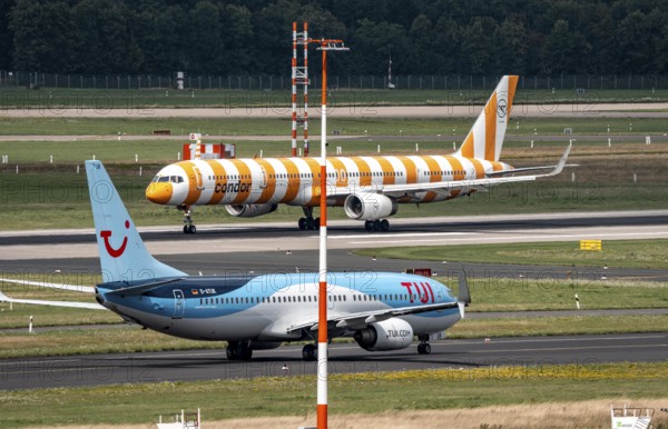 Düsseldorf Airport, Condor Airbus on take-off, TUIFly Boeing 737 on the way to take-off, North Rhine-Westphalia, Germany