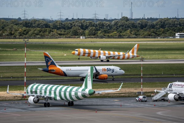 Düsseldorf Airport, Condor Airbus A321-200, aircraft on the apron, Condor Airbus A321-271NX on take-off, HiSky Europe Airbus A320-200 on the taxiway for take-off, North Rhine-Westphalia, Germany