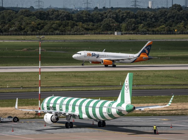 Düsseldorf Airport, Condor Airbus A321-200, aircraft on the apron, HiSky Europe Airbus A320-200 taking off, North Rhine-Westphalia, Germany