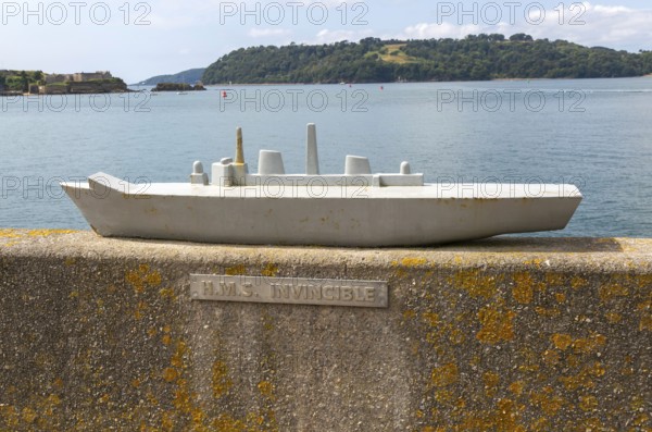 Steel model of HMS Invincible navy ship on seafront wall, city of Plymouth, Devon, England, UK