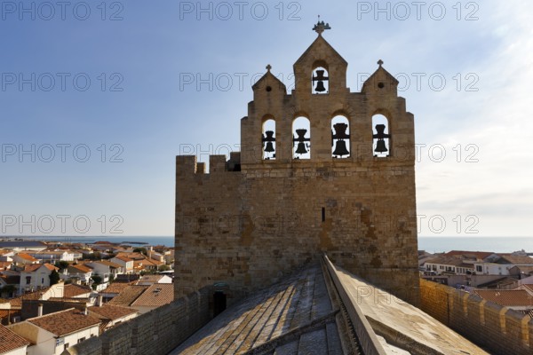 Bell tower of Notre-Dame-de-la-Mer church, panoramic view, view of the town and the sea from the roof of the fortified church, Saintes-Maries-de-la-Mer, Camargue, France