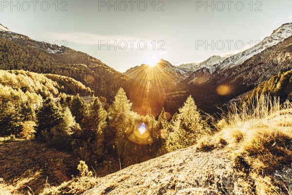 Autumn atmosphere in the Swiss Alps in the Engadine. Photographed from the village of Maloja on the Maloja Pass