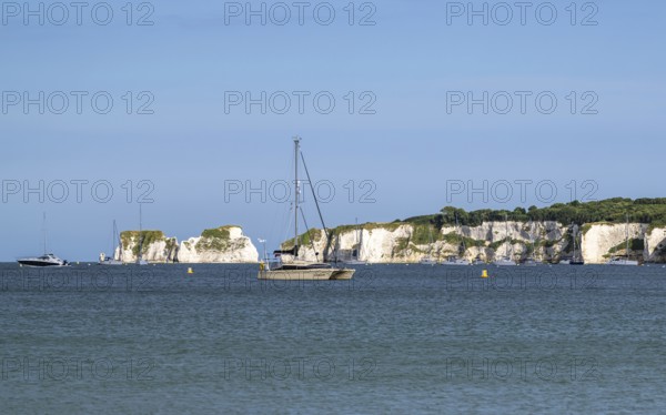 Boats on sea over Knoll Beach Studland, Poole, Dorset, England, United Kingdom