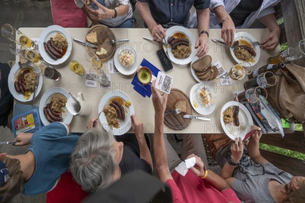 Meal in a pub in Middle Franconia, Franconian Obazda, dressed cheese, sausages with sauerkraut and bread, Middle Franconia, Bavaria, Germany