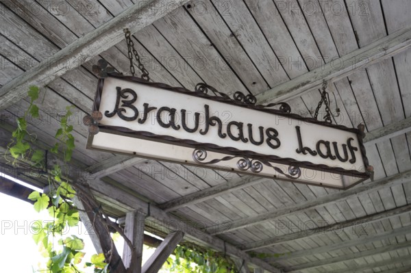 Old, wrought-iron brewery sign in a pub, Franconia, Bavaria, Germany