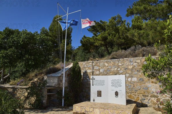 HMS Intrepid, British battleship, Greek battleship AT Olga, memorial with two flags and a plaque in front of a stone wall, photos related to WW2, Battle of Leros, Lakki, Leros, Dodecanese, Greek Islands, Greece