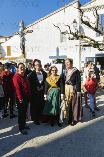 Women in traditional costumes, pilgrimage, procession in Saintes-Maries-de-la-Mer, Camargue, France