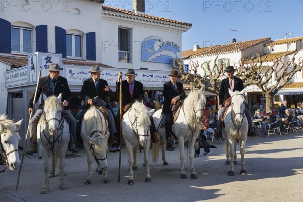Guardians of the Camargue, traditional shepherds, riders on Camargue horses, pilgrimage, procession in Saintes-Maries-de-la-Mer, Camargue, France