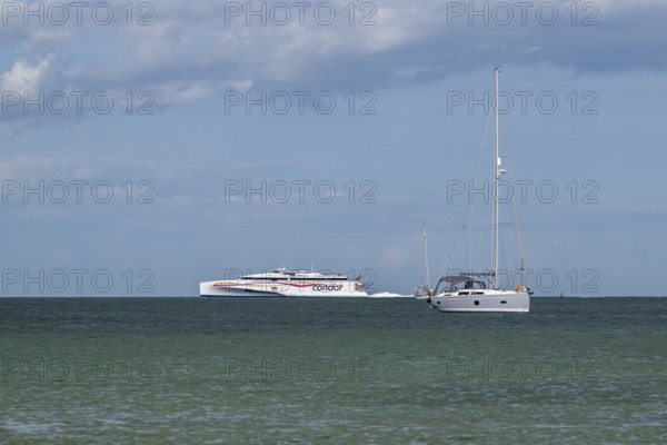 Boats on sea over Knoll Beach Studland, Poole, Dorset, England, United Kingdom