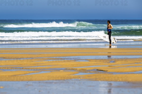 Surfer on Contis beach, Saint Julien en Born, Saint-Julien-en-Born, Landes, France