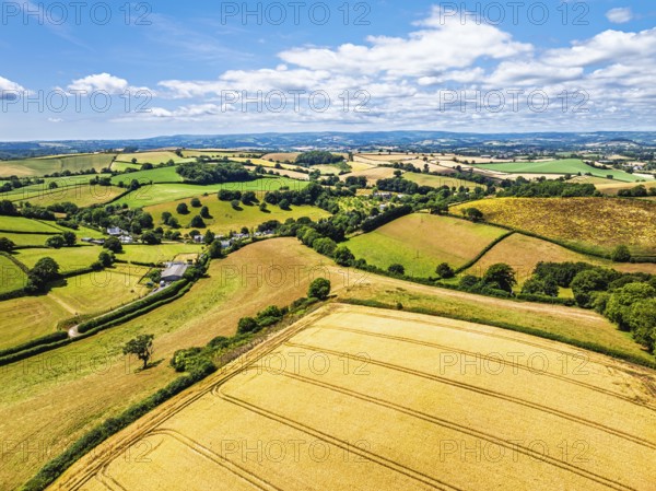 DefaultFarms and Fields over Torquay from a drone, Devon, England, United Kingdom