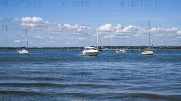 Boats over Brownsea Island, Poole, Dorset, England, United Kingdom