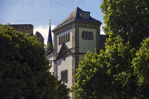 Max Planck Institute for Mathematics, church tower of Bonn Minster and Sterntor on Bottlerplatz with lots of greenery, Bonn, North Rhine-Westphalia, Germany