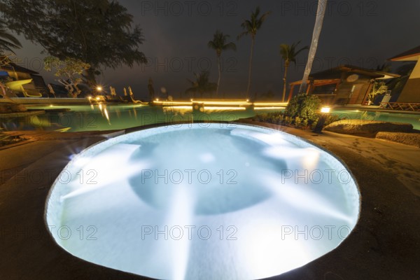 Illuminated swimming pool on the island of Koh Chang, Andaman Sea, Southern Thailand, Thailand