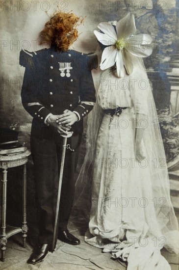A couple dressed in historical wedding attire stands together. Their faces are creatively replaced with a floral and natural design