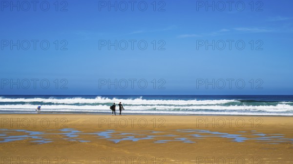 Surfer on Contis beach, Saint Julien en Born, Saint-Julien-en-Born, Landes, France