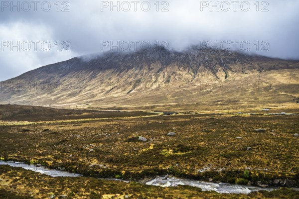 Eas a' Bhradain waterfall, Red Cuillin mountains, Loch Ainort, Isle of Skye, Scotland, UK