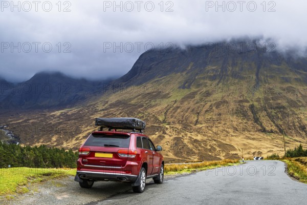 Off road 4x4 car with roof tent on Fairy Pools and Waterfalls, Glen Brittle, Black Cuillin, Isle of Skye, Scotland, UK