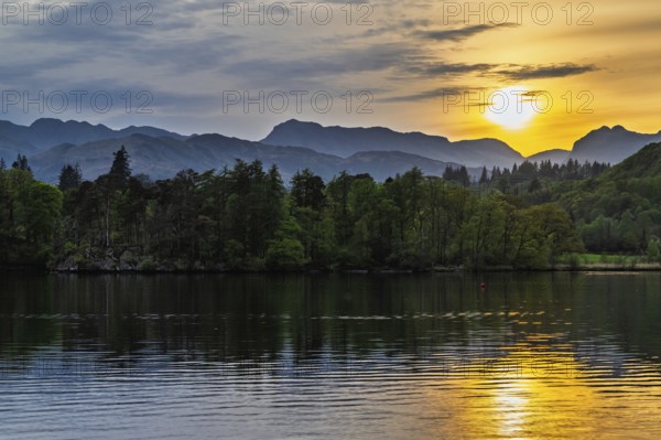 Sunset over Windermere Lake from a drone, Ambleside, Lake District, Cumbria, England, United Kingdom