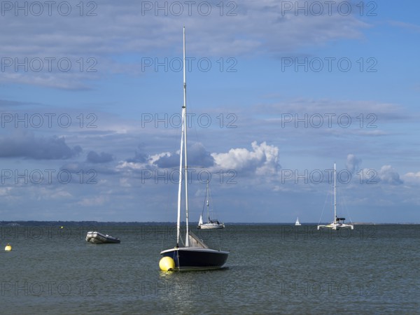 Boats on sea over Knoll Beach Studland, Poole, Dorset, England, United Kingdom