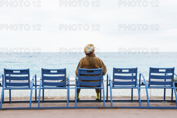 Woman on the promenade, Nice, Alpes Maritimes, Provence Alpes Cote d'Azur, French Riviera, South of France, France