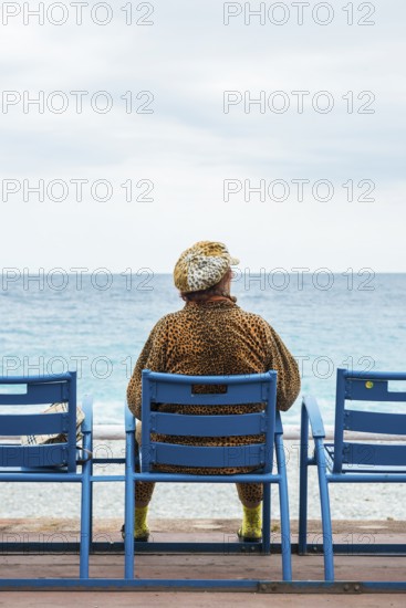 Woman on the promenade, Nice, Alpes Maritimes, Provence Alpes Cote d'Azur, French Riviera, South of France, France