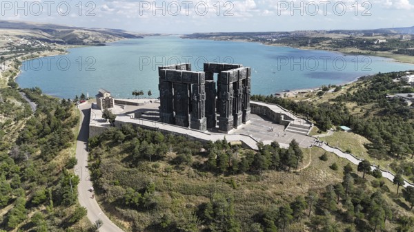 Aerial view of the Chronicle of Georgia with the Tbilisi Sea in the background