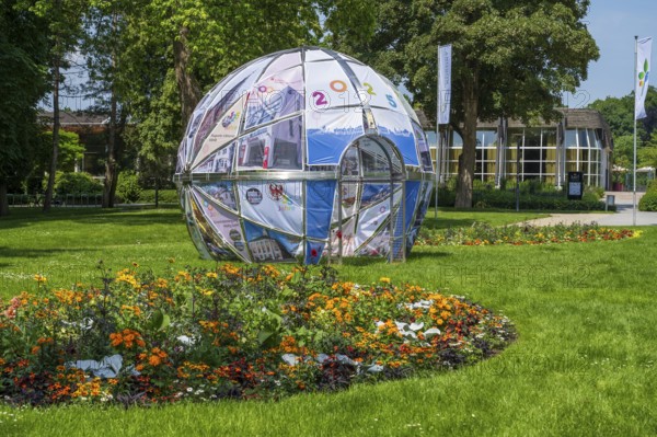 Park in front of the entrance to the garden show, walk-in sphere, pavilion, Bad Lippspringe, climatic health resort, Westphalia, North Rhine-Westphalia, Germany