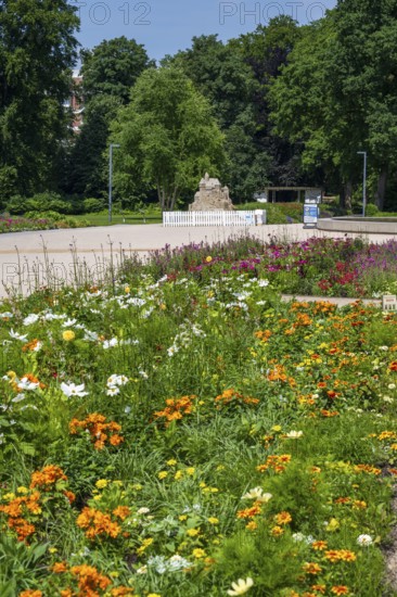 Flower bed and sand sculpture, Kaiser-Karls-Park, garden show, Bad Lippspringe, climatic health resort, Westphalia, North Rhine-Westphalia, Germany