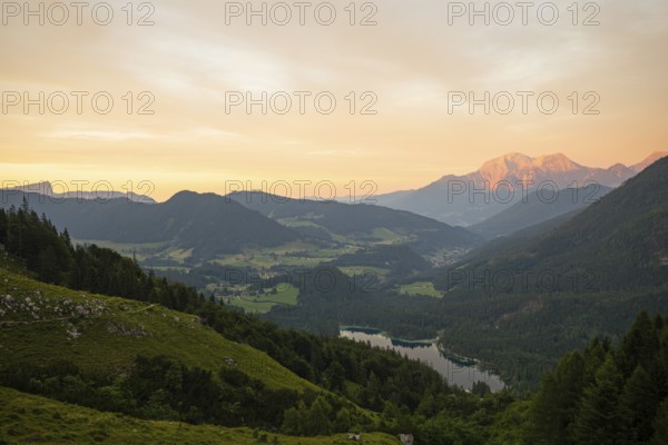 Magical sunset at the Halsalm above the Hintersee with views of the Hoher Göll and Untersberg mountains
