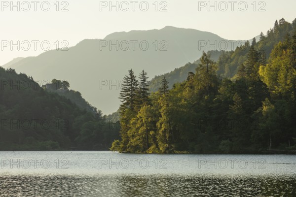 Sunrise in summer at Lake Thumsee near Bad Reichenhall. With a view of the Karlstein castle ruins